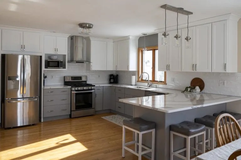 kitchen-makeover_cambria_brittanicca_seville-cabinetry_captains-cabinetry_charlotte_mi-378-cropped-768x512.jpeg